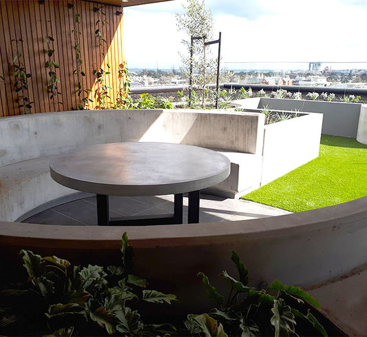 Creating a Cozy Outdoor Oasis with Concrete Furniture